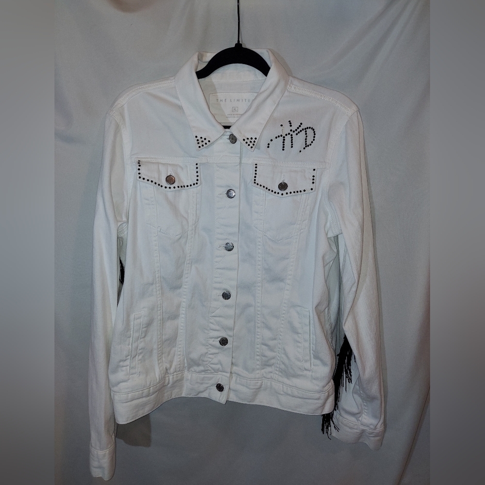 The Limited White Denim Jacket with Studded Details, Black Fringe, & Cross Patch